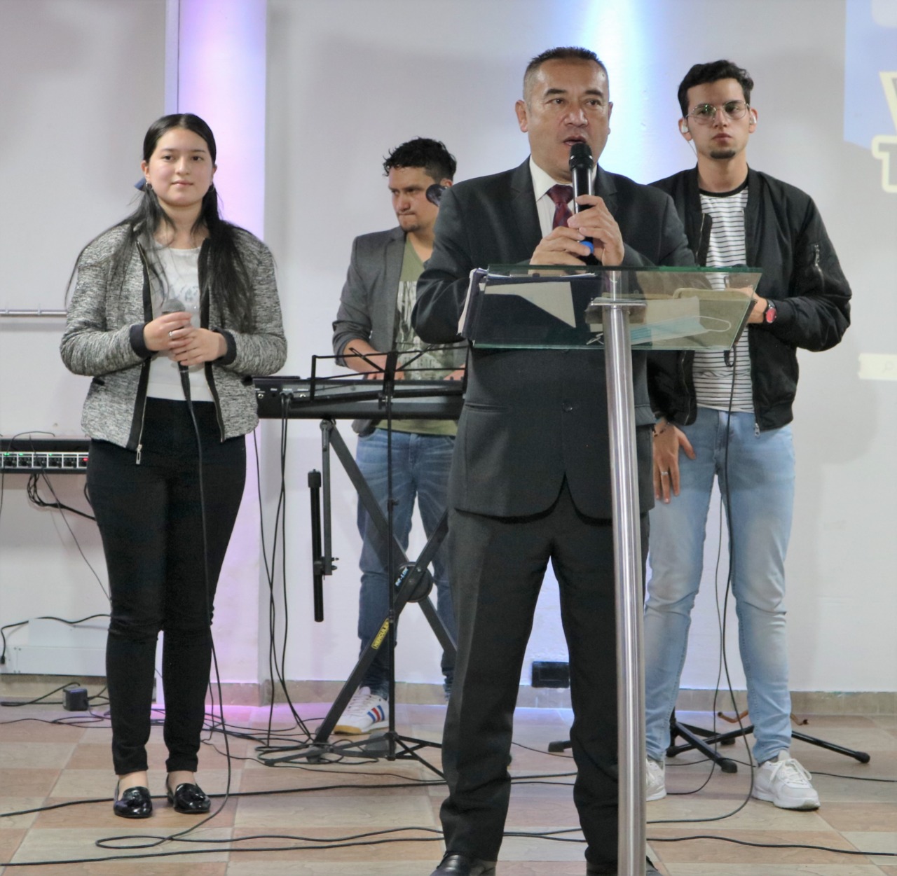Pastor Germain preaching